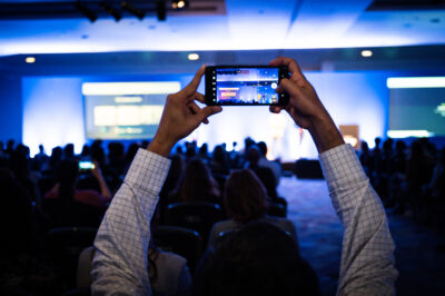 Audience Member Capturing The Moment